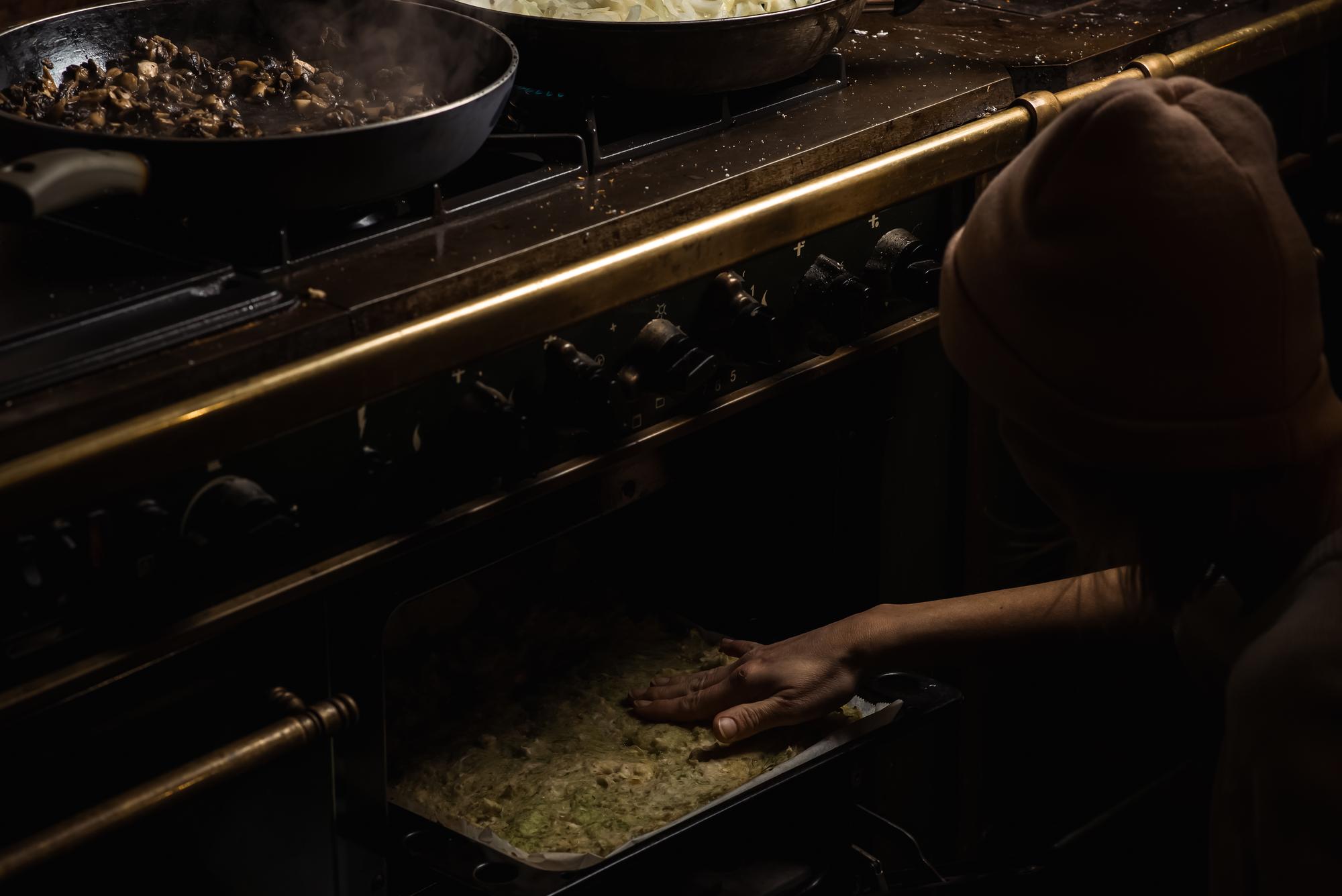 Interior of small luxury culinary studio with copper pans